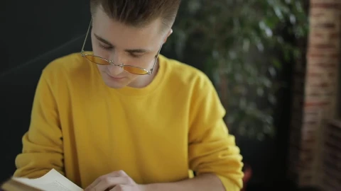 Stock Footage Young Student Studies For Exam Near Sunny Window Live Wallpaper Free - Free Live Wallpaper