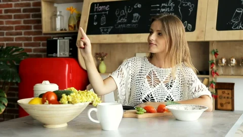 Stock Footage Woman Watches Futuristic Hologram Panel In Kitchen Live Wallpaper Free - Free Live Wallpaper