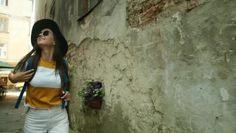 Stock Footage Woman Touring Rome Looks Up At Old Building Live Wallpaper Free - Free Live Wallpaper