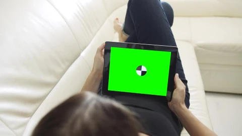 Stock Footage Woman Looking At Chroma Key Website On Tablet Live Wallpaper Free - Free Live Wallpaper