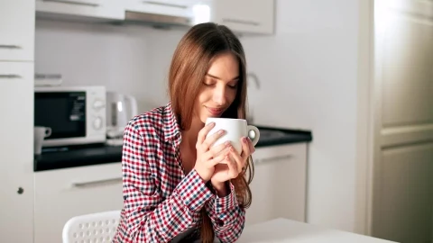 Stock Footage Woman Enjoys Coffee Aroma In Sunlit Kitchen Live Wallpaper Free - Free Live Wallpaper