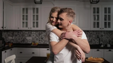 Stock Footage Woman Gives Man Thank You Hug In Kitchen Live Wallpaper Free - Free Live Wallpaper