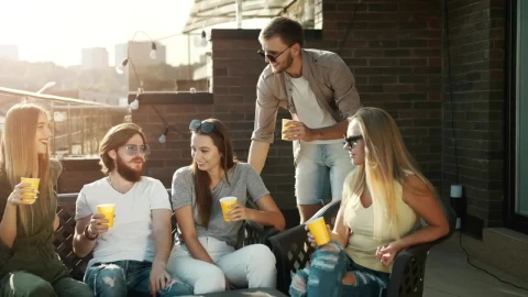 Stock Footage Young People Toast To Friendship On Sunlit Terrace Live Wallpaper Free - Free Live Wallpaper