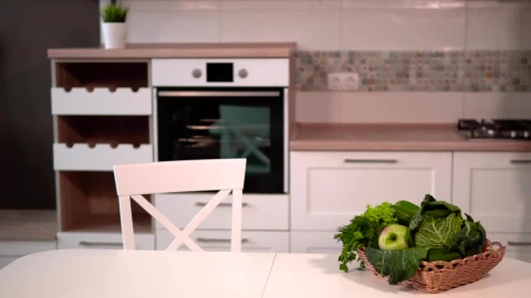 Stock Footage Woman Unpacks Groceries On Kitchen Table Live Wallpaper Free - Free Live Wallpaper