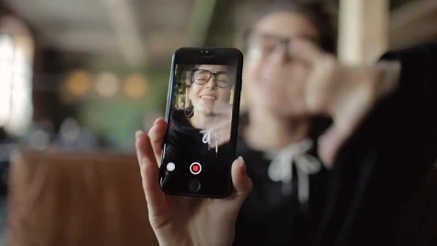 Stock Footage Young Woman Records Social Media Video In Cafe Live Wallpaper Free - Free Live Wallpaper