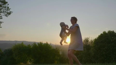 Stock Footage Woman In A Dress With Her Daughter Live Wallpaper Free - Free Live Wallpaper
