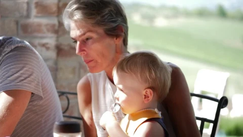 Stock Footage Woman Holding A Young Child Live Wallpaper Free - Free Live Wallpaper