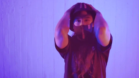 Stock Footage Young Woman With A Face Mask Dancing Facing The Shot Live Wallpaper Free - Free Live Wallpaper