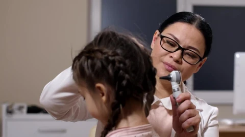 Stock Footage Woman Examining A Sick Girl Live Wallpaper Free - Free Live Wallpaper