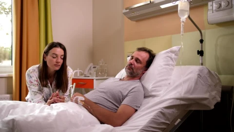 Stock Footage Worried Woman By Her Husband In Hospital Live Wallpaper Free - Free Live Wallpaper