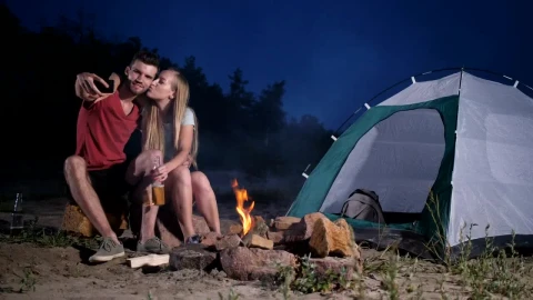 Stock Footage Young Couple Enjoying A Camping Trip Live Wallpaper Free - Free Live Wallpaper