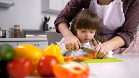 Stock Footage Young Girl Cutting Peppers Live Wallpaper Free - Free Live Wallpaper