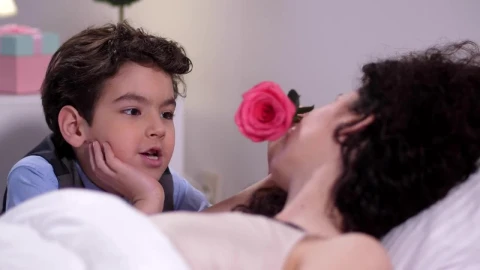 Stock Footage Young Boy Giving His Mother A Flower Live Wallpaper Free - Free Live Wallpaper