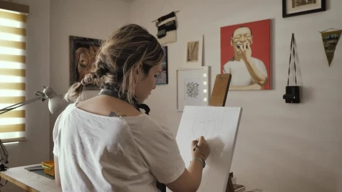 Stock Footage Woman Drawing Baselines On A White Canvas Live Wallpaper Free - Free Live Wallpaper