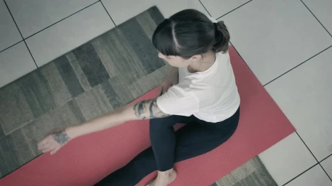Stock Footage Young Woman Doing Yoga On A Red Mat Live Wallpaper Free - Free Live Wallpaper