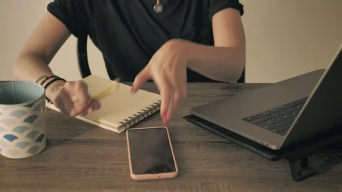 Stock Footage Young Woman Stops Her Work To Answer A Call Live Wallpaper Free - Free Live Wallpaper