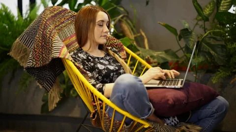 Stock Footage Woman In A Garden Working On A Computer Live Wallpaper Free - Free Live Wallpaper