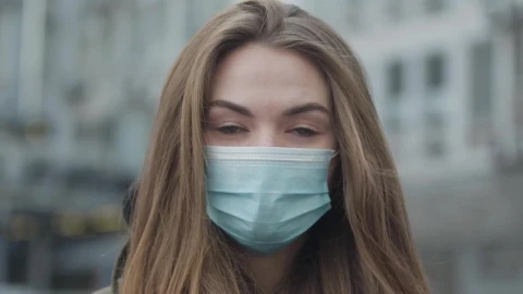 Stock Footage Woman Looking At The Camera With A Mask Live Wallpaper Free - Free Live Wallpaper
