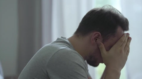 Stock Footage Worried And Sad Man With His Head Down Live Wallpaper Free - Free Live Wallpaper