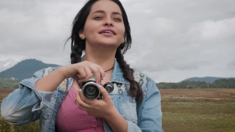 Stock Footage Young Woman Taking Photos In The Field Live Wallpaper Free - Free Live Wallpaper