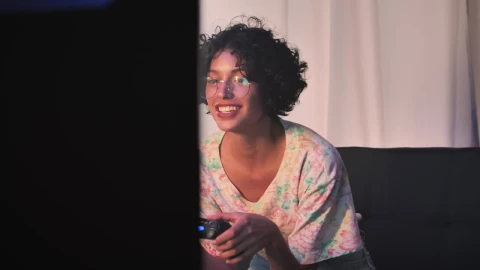 Stock Footage Young Woman Playing Video Games On The Sofa Live Wallpaper Free - Free Live Wallpaper