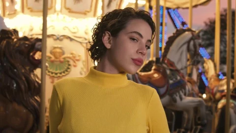 Stock Footage Woman Standing In Front Of Carrousel Live Wallpaper Free - Free Live Wallpaper
