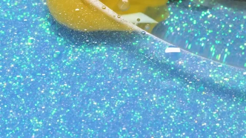 Stock Footage Yellow Liquid And Blue Glitter Live Wallpaper Free - Free Live Wallpaper