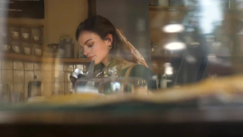 Stock Footage Woman Reading At Coffee Shop Live Wallpaper Free - Free Live Wallpaper