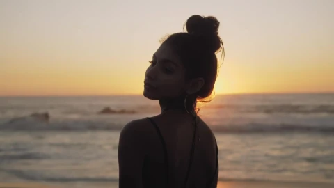 Stock Footage Woman Lets Down Hair At The Beach Live Wallpaper Free - Free Live Wallpaper