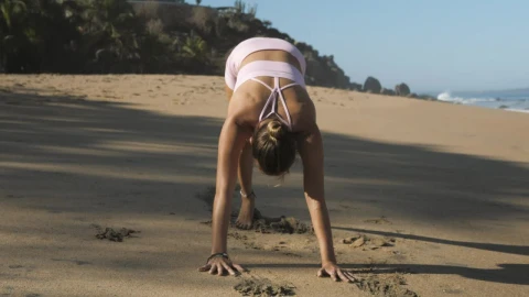 Stock Footage Woman Stretching And Doing Yoga On The Beach Live Wallpaper Free - Free Live Wallpaper