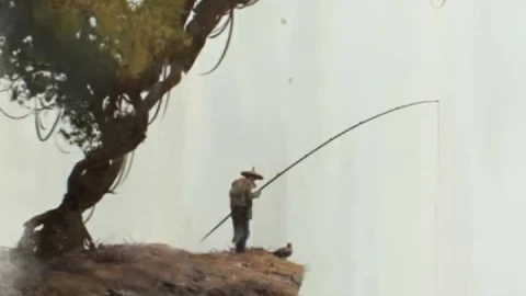 iPhone and Android Fisherman Fishing At Waterfall Live Phone Wallpaper - Free Live Wallpaper
